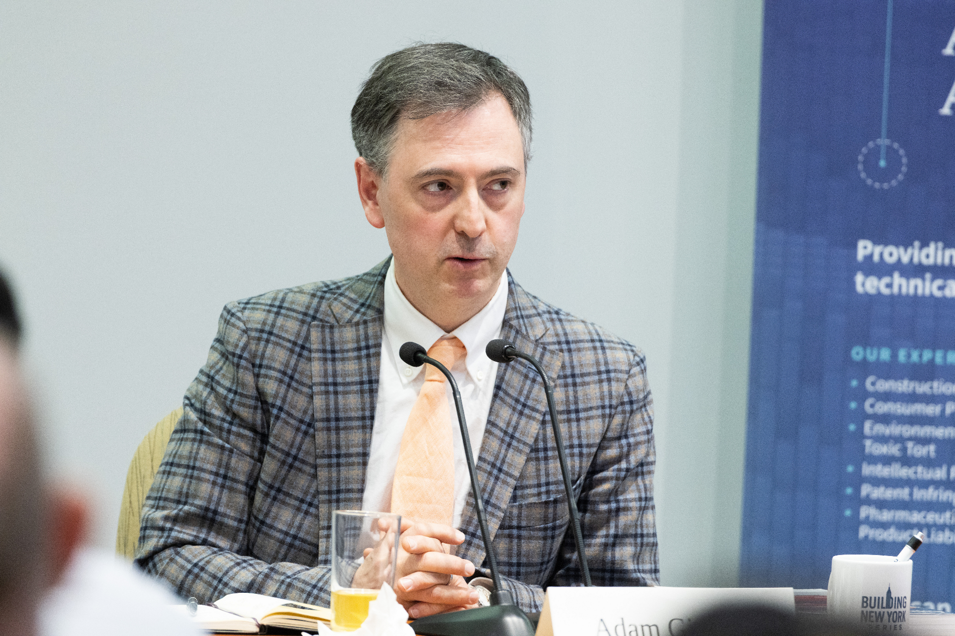 Panelist Adam Giuliano speaking during the airport development panel discussion