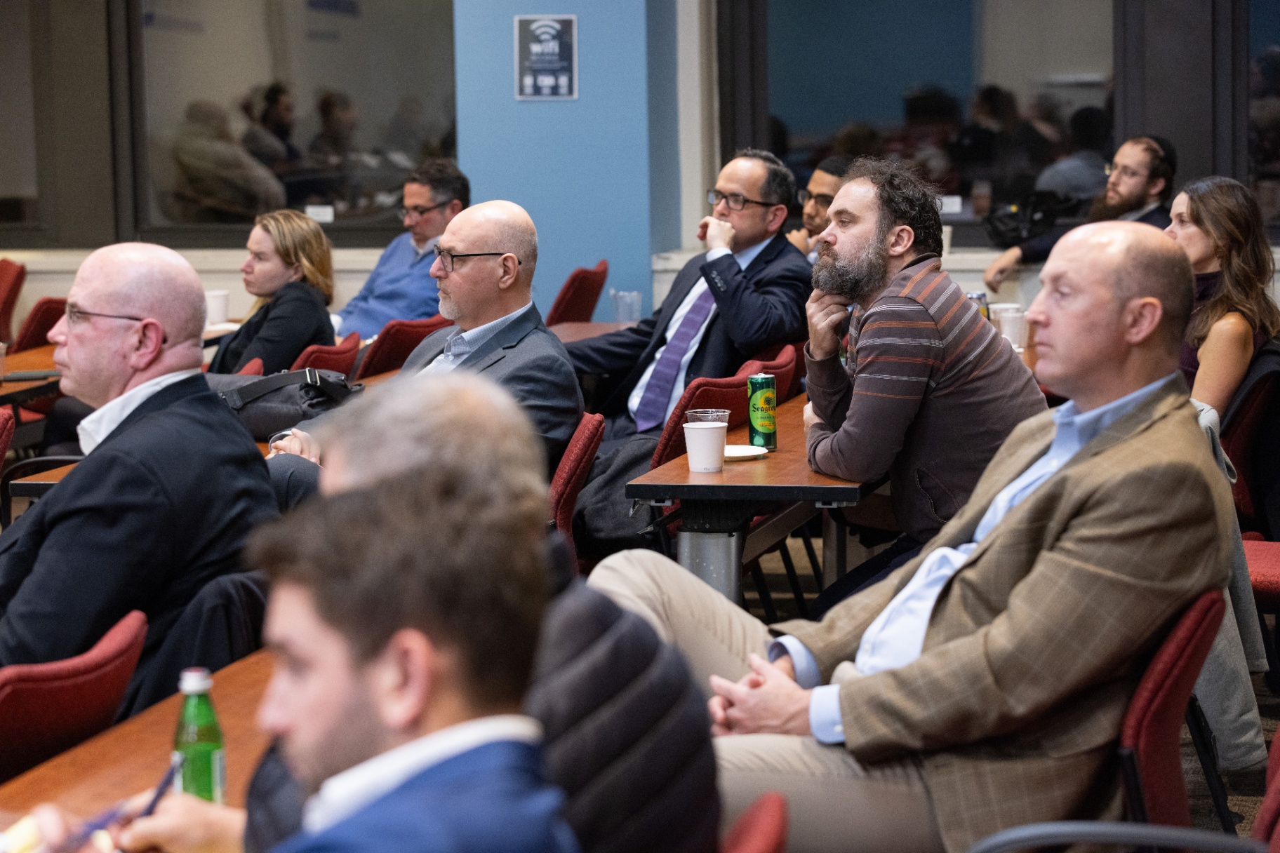 Members of the audience following the panel discussion