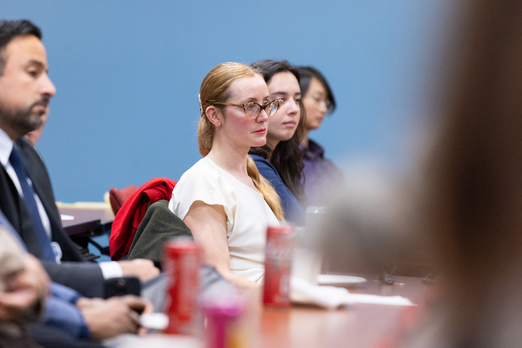 Attendees listening attentively from the audience